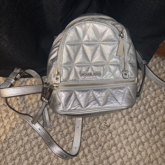 Michael Kors Handbags - Michael Kors Silver Backpack